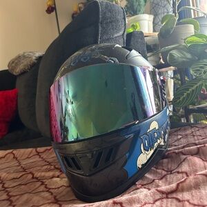 Black and Blue Motorcycle Helmet with Iridescent Visor